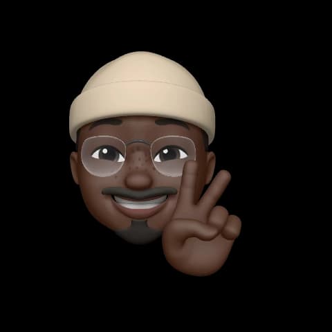 A memoji image of Femi with the peace sign gesture